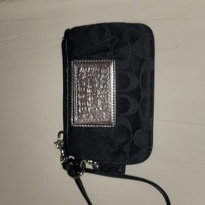 Small Coach wristlet.